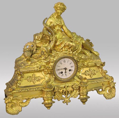 Decorative clock with intricate gold detailing