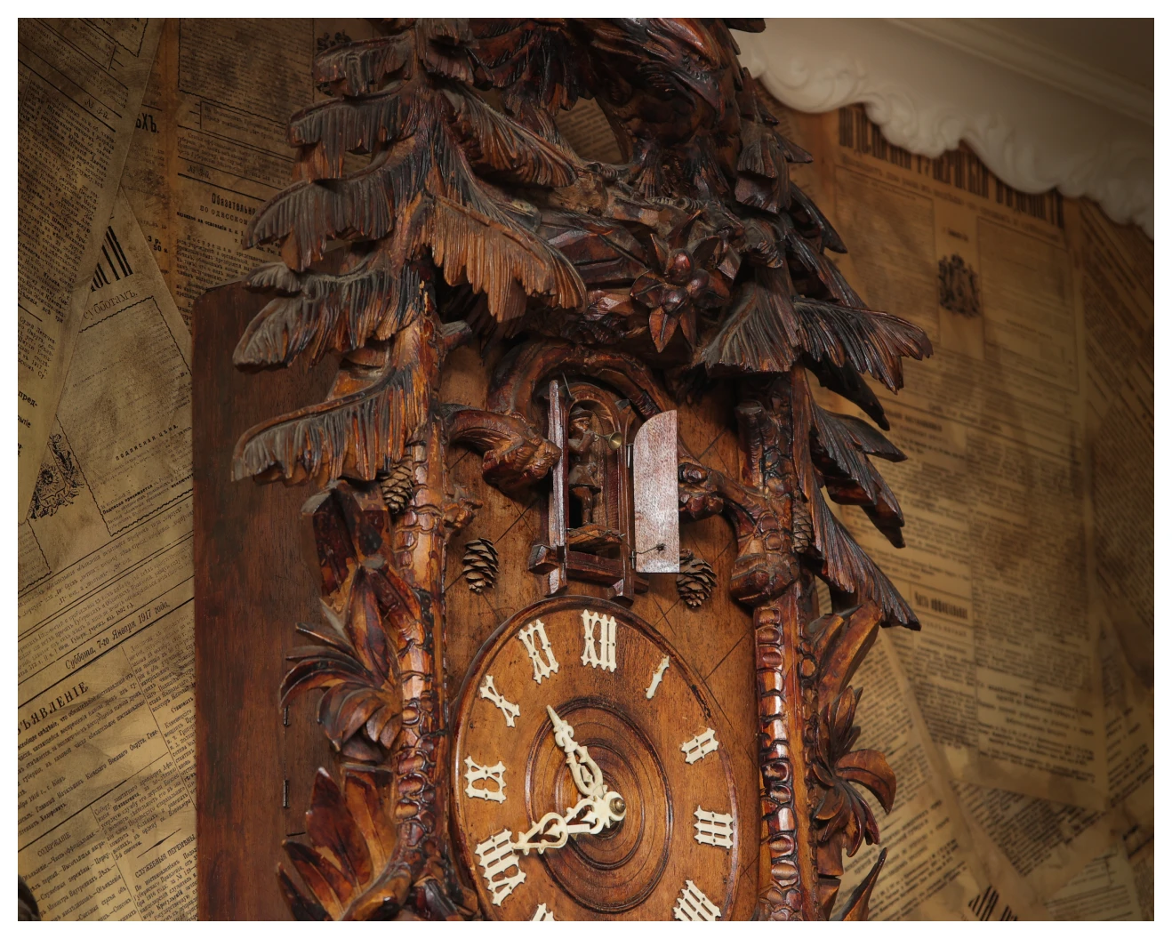 Ornate wooden cuckoo clock close-up