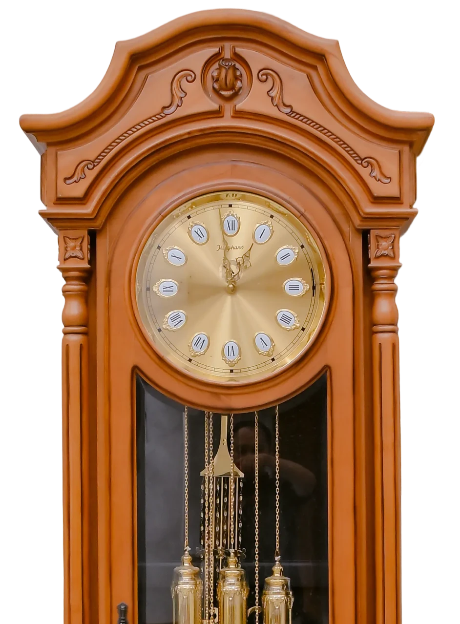 Ornate wooden grandfather clock with pendulum